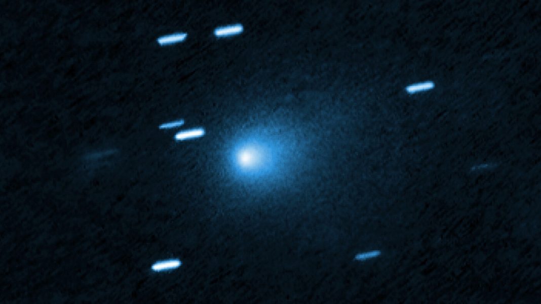 Astronomers are baffled by the blue glow of interstellar comet 3I/ATLAS.