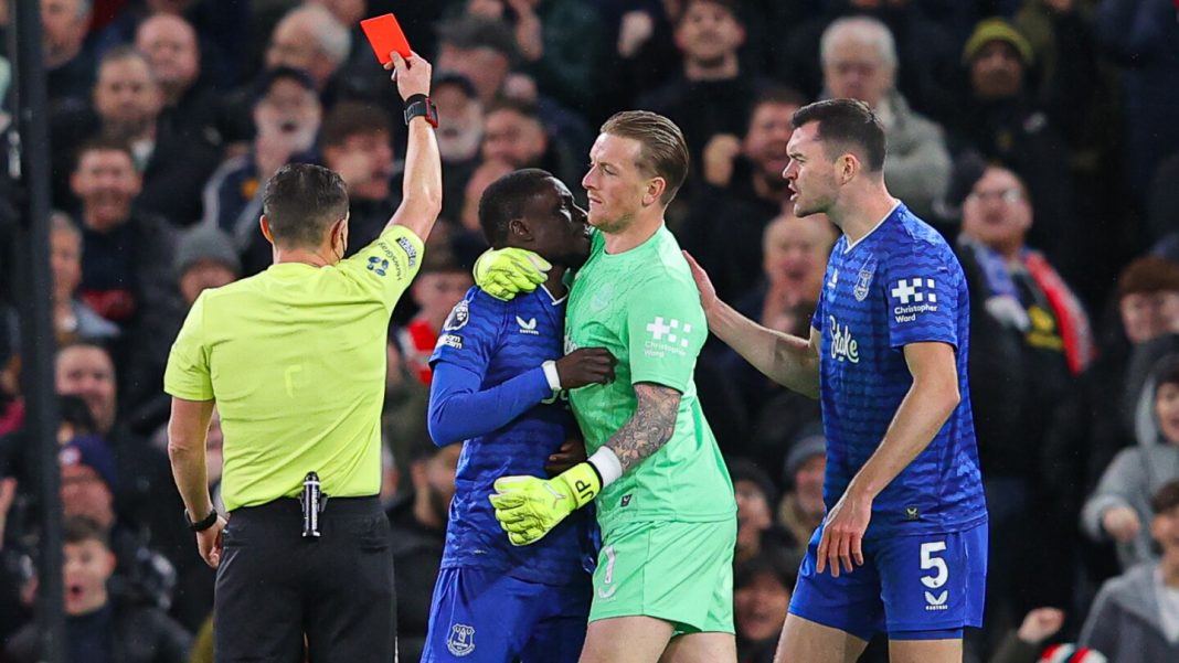 Idrissa Gana Gueye apologizes after getting a red card for slapping Everton teammate Michael Keane in the face.