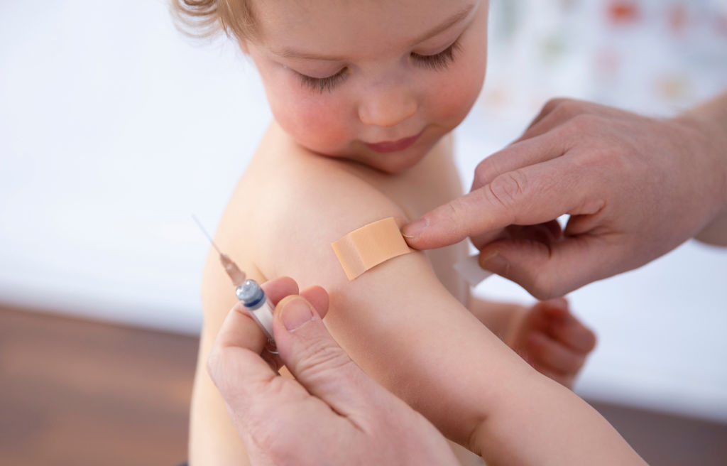 HHS to revise kids' vaccine schedule, recommending fewer shots.