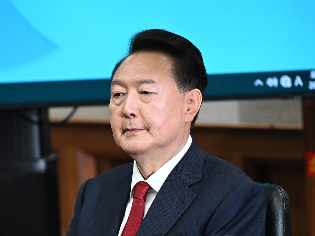 A South Korean court sentenced the country's former president to 5 years over a martial law case.