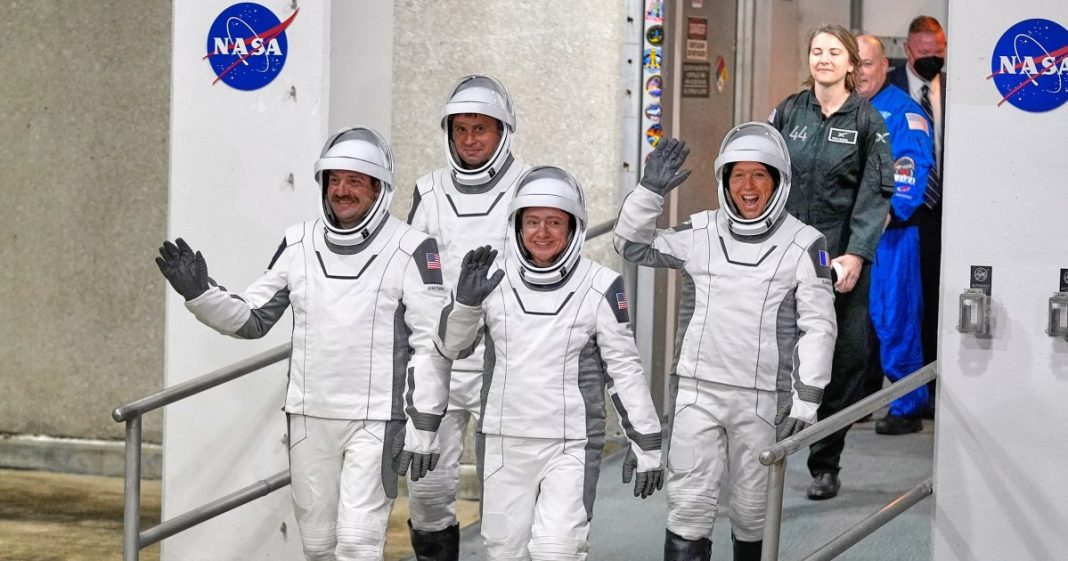 Four astronauts get to the space station after the previous crew left early.
