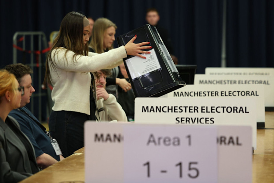 Counting votes in the Gorton and Denton by-election.