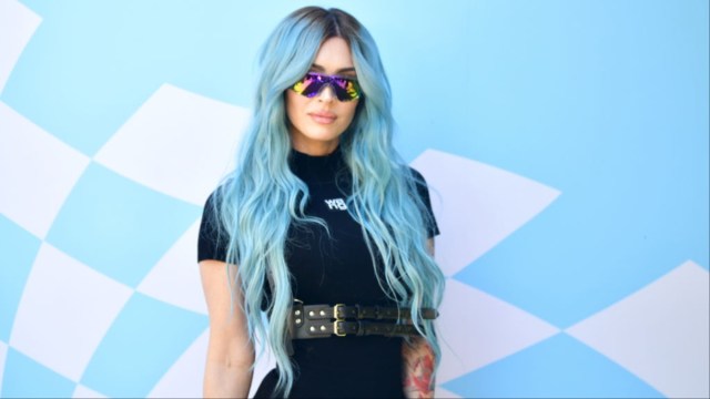 Megan Fox is back on Instagram, sporting a bold corset and sheer tights.