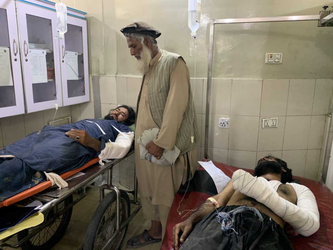 Truck carrying Afghan returnees from Pakistan flips on highway, killing 18 Truck carrying Afghan returnees from Pakistan flips on highway, killing 18
