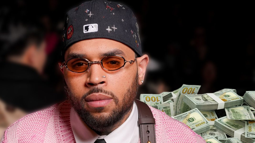 Chris Brown's security head says the singer paid his ex-housekeeper a five-figure sum after a dog attack. Chris Brown's security head says the singer paid his ex-housekeeper a five-figure sum after a dog attack.