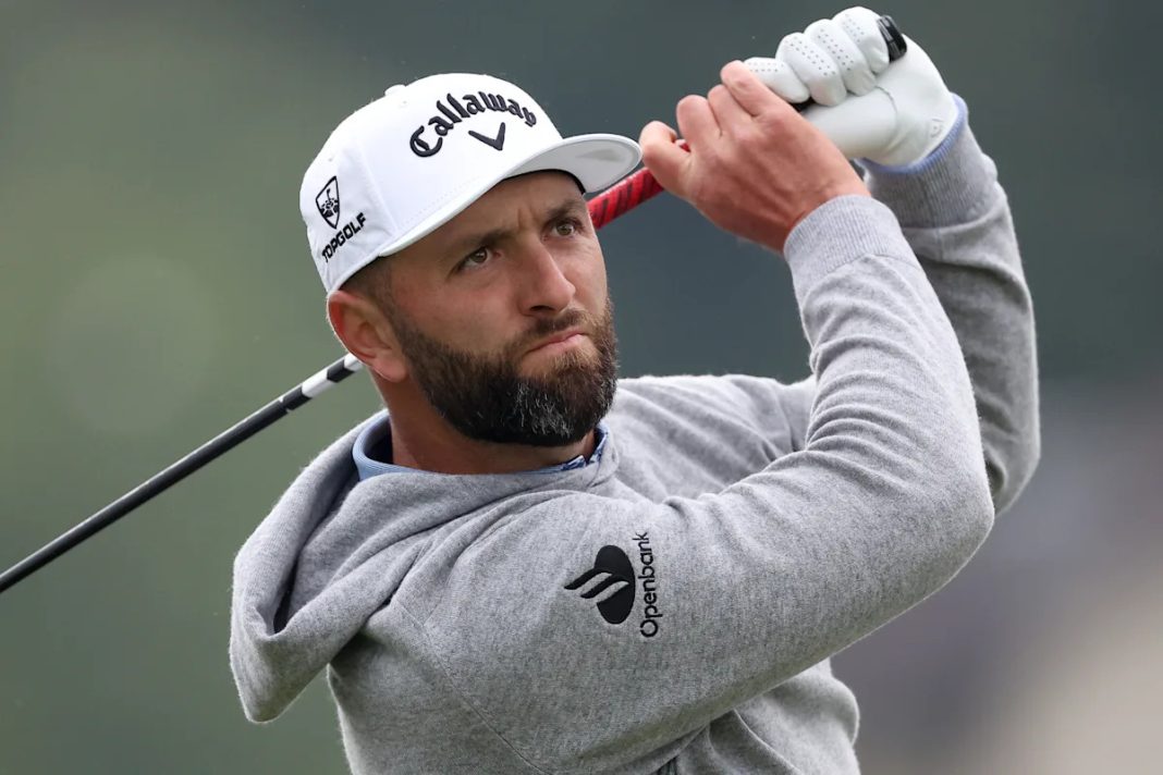 Jon Rahm says sorry after his divot hit a volunteer in the face during the PGA Championship's opening round.