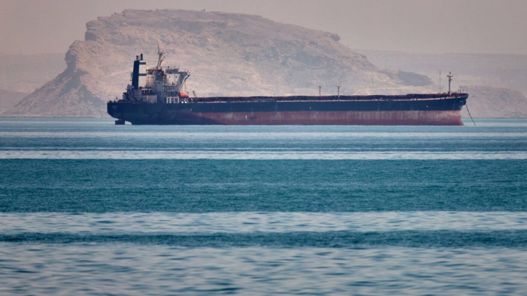 Trump says the U.S. has put its mission to help ships stuck in the Strait of Hormuz on hold.